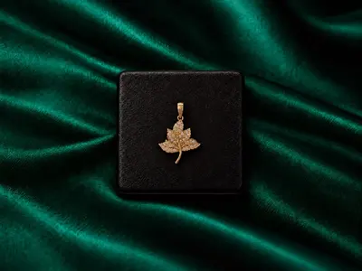 Leaf pendant in 10k gold. 
